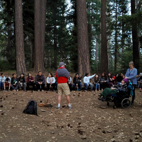 Students gathered on a night hike