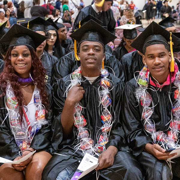 Students wearing caps and gowns