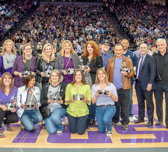 Teachers of the Year 2019 posing on the Kings court