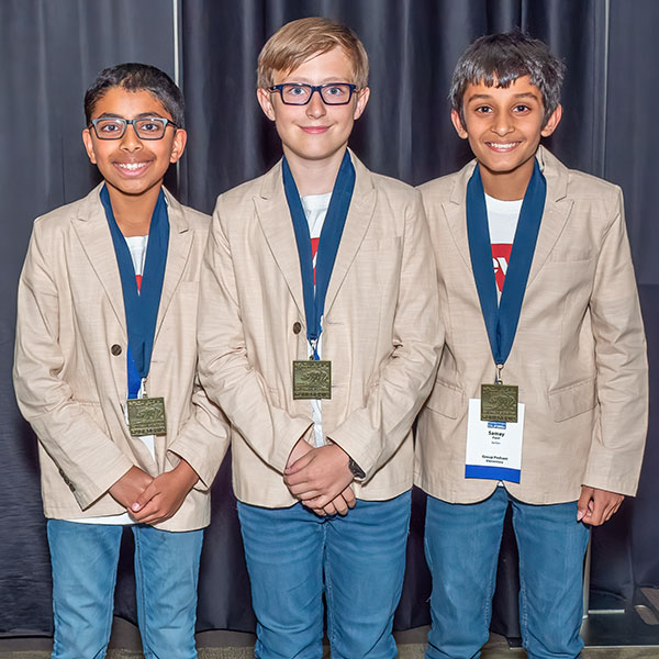 Vedansh Shetty, Eddie Sharp, and Samay Patel posing