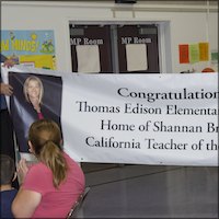 Congratulatory banner being unveiled