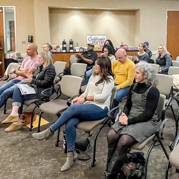 Seated audience members