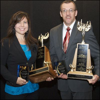 Deanna Victor and Tim Smith holding trophies