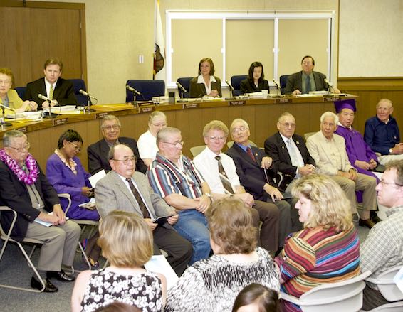 Diploma recipients sit in front of the Sacramento County Board of Education