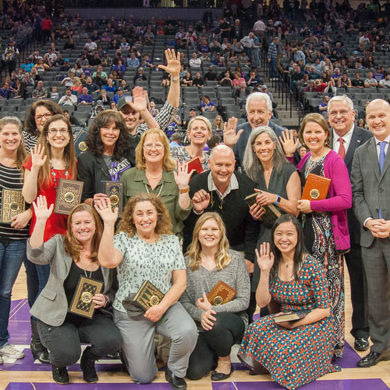 Teachers of the Year waving on-court at Golden 1 Center