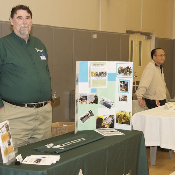 Adults talking about resources with Juvenile Court School students