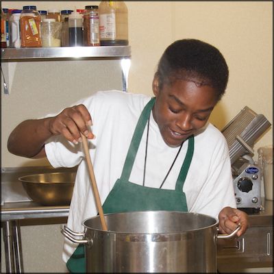 Student stirring food