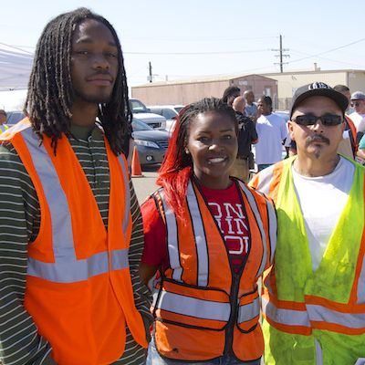Attendees wearing reflective vests
