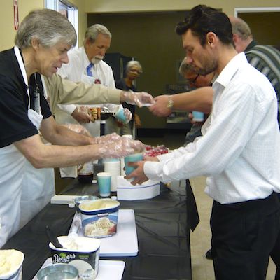 Board member scooping ice cream