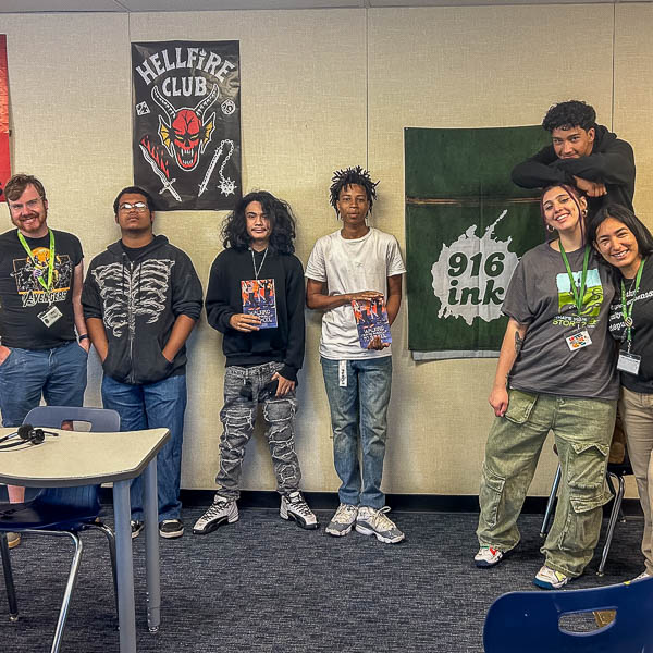 Students posing with staff
