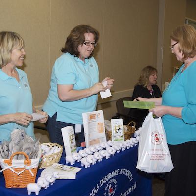 Employees receiving stickers