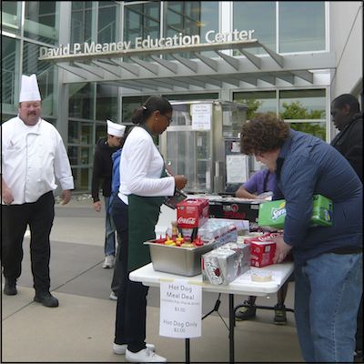 Students selling hot dogs
