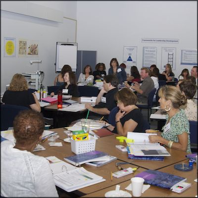 Teachers seated in classroom