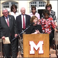 Jan Scully speaking at podium