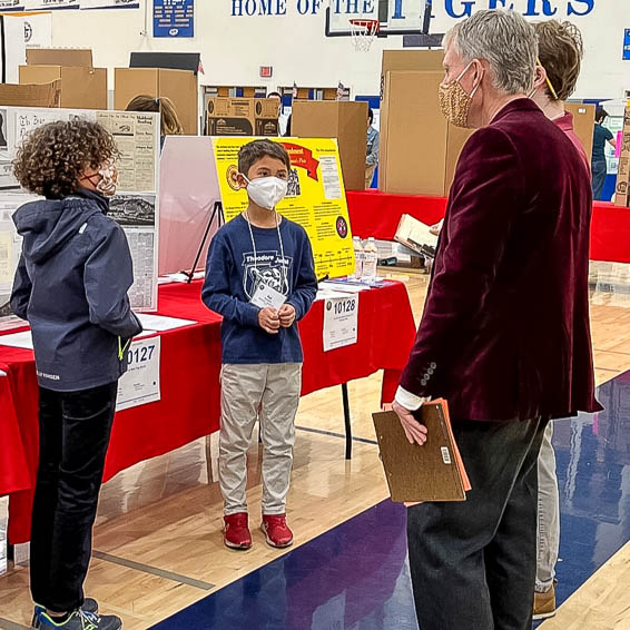 Students talking to judges