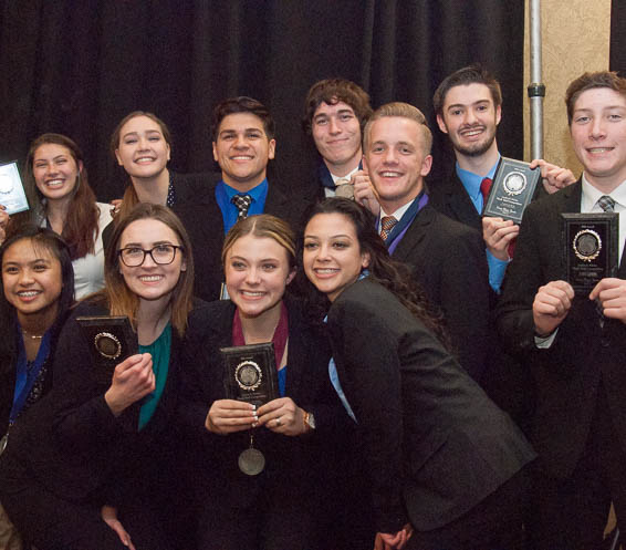 Elk Grove H.S. team holding first place plaques