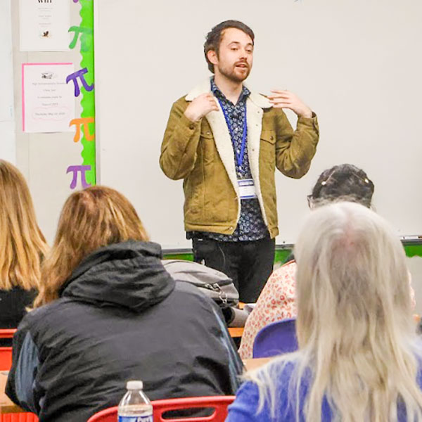 Presenter speaking to audience
