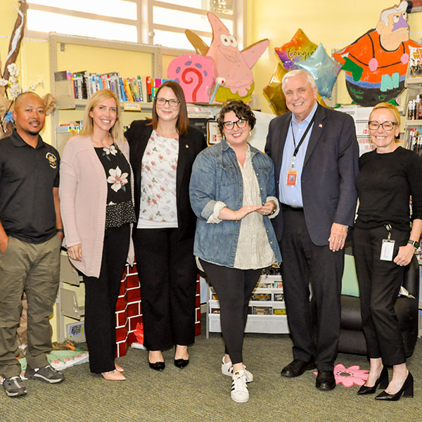 Jessie Storrs posing with colleagues