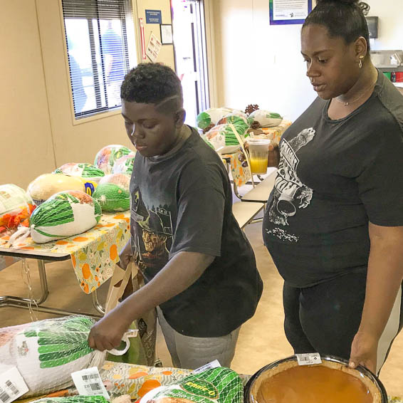 Family members picking out turkeys