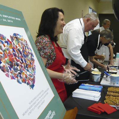 Superintendent's Cabinet serving treats