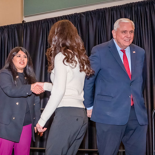 Student shaking hands