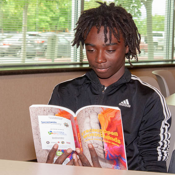 Student reading book