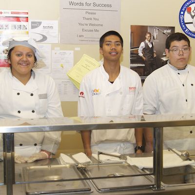 Students serving food