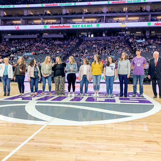 Teachers of the Year 2022 standing at center court of Golden 1 Center