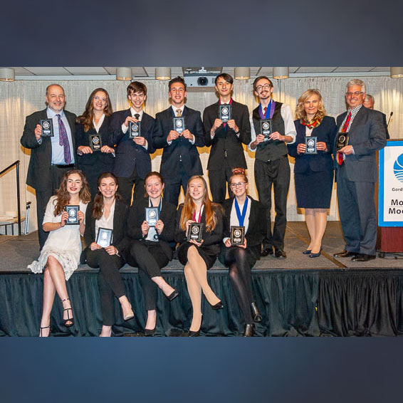 Del Campo H.S. Mock Trial team posing with plaques