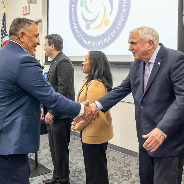 Graduate shaking hands with superintendent
