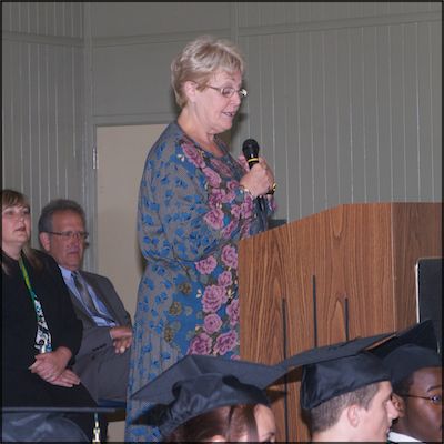 Sue Stickel speaking at lectern