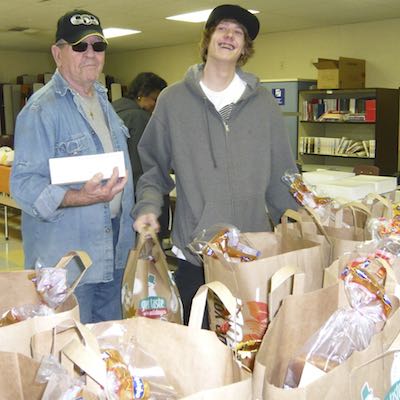 Family with bags of food