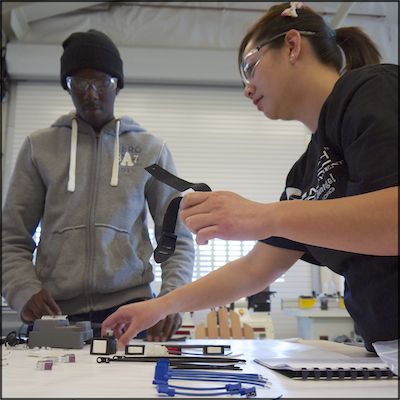 Students assembling solar case