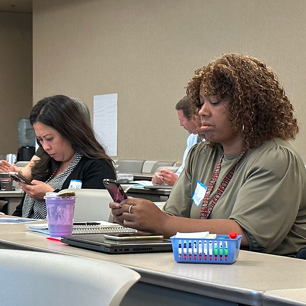 Participants submitting information on phones