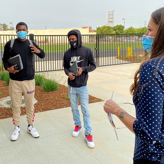 Students talking to staff