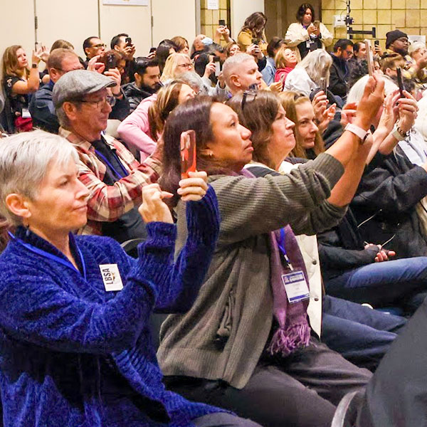 Audience using phones to take pictures