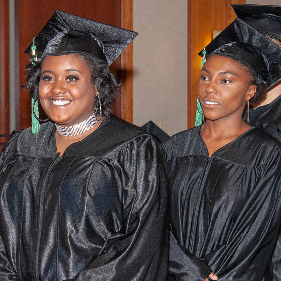 Graduates smiling