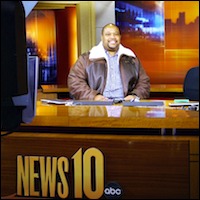 Daniel Watts sitting in the News10 studio