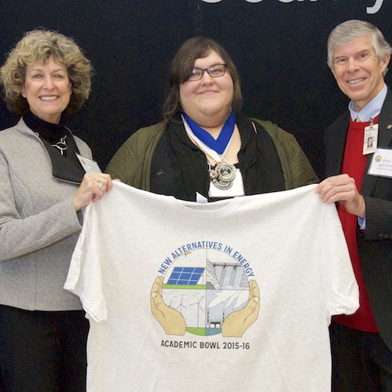 Art Competition winner standing with Board members