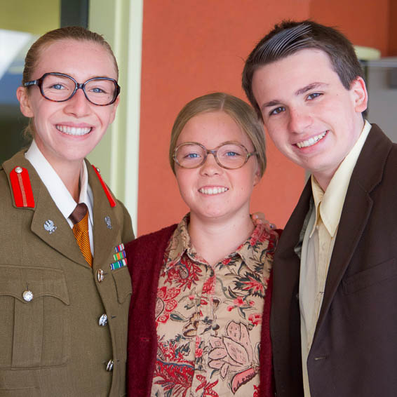 Students dressed in military uniforms