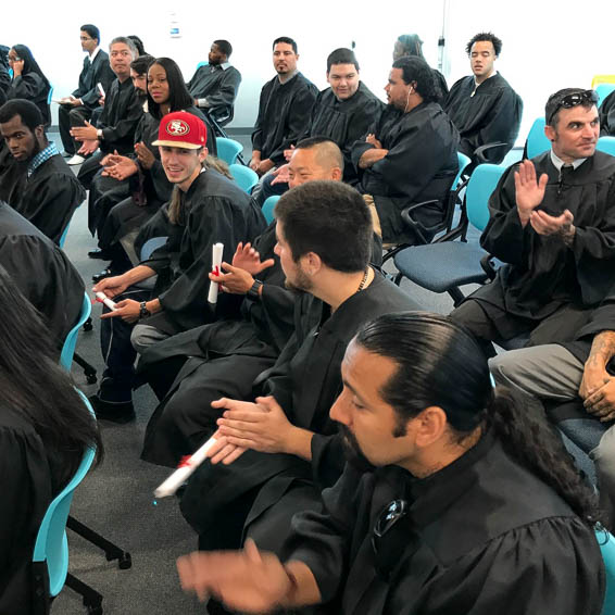 Overhead view of seated graduates