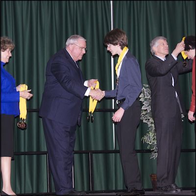 Dave Gordon and Board trustees presenting medals