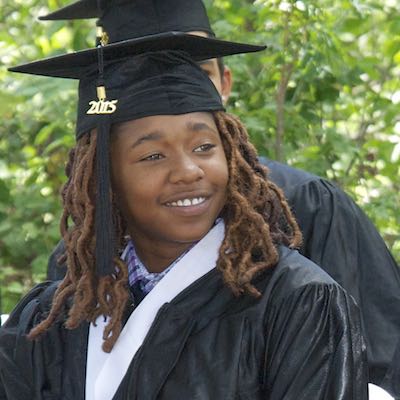 Student wearing cap and gown