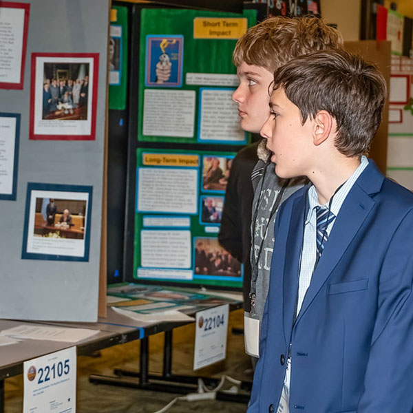 Students looking at projects