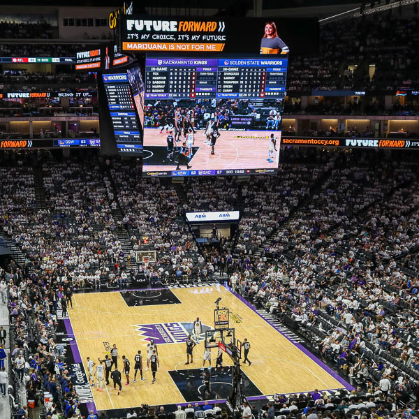 Jumbotron showing Future Forward message during game play