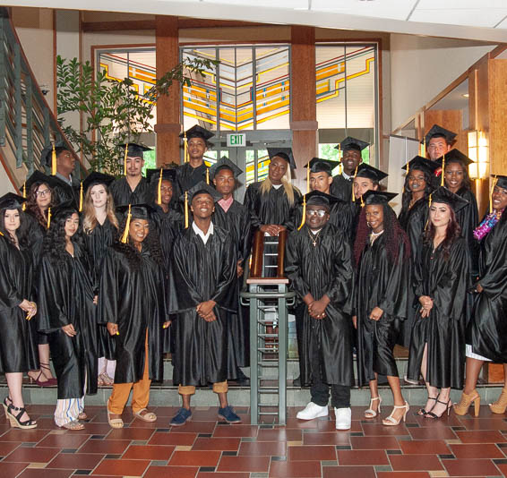 Group of graduates wearing caps and gowns