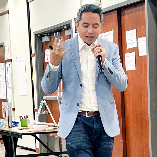 Minh Le speaking