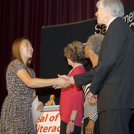 Student receiving certificate