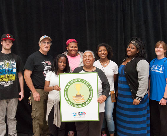 Daylor High School team holding Academic Bowl sign