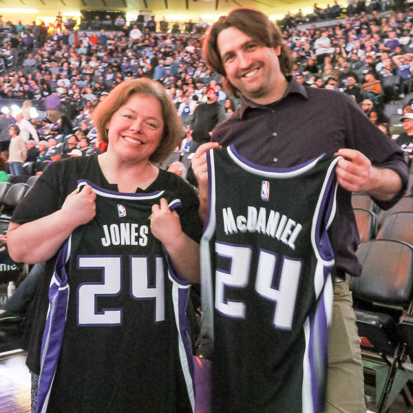 Teachers posing with custom jerseys